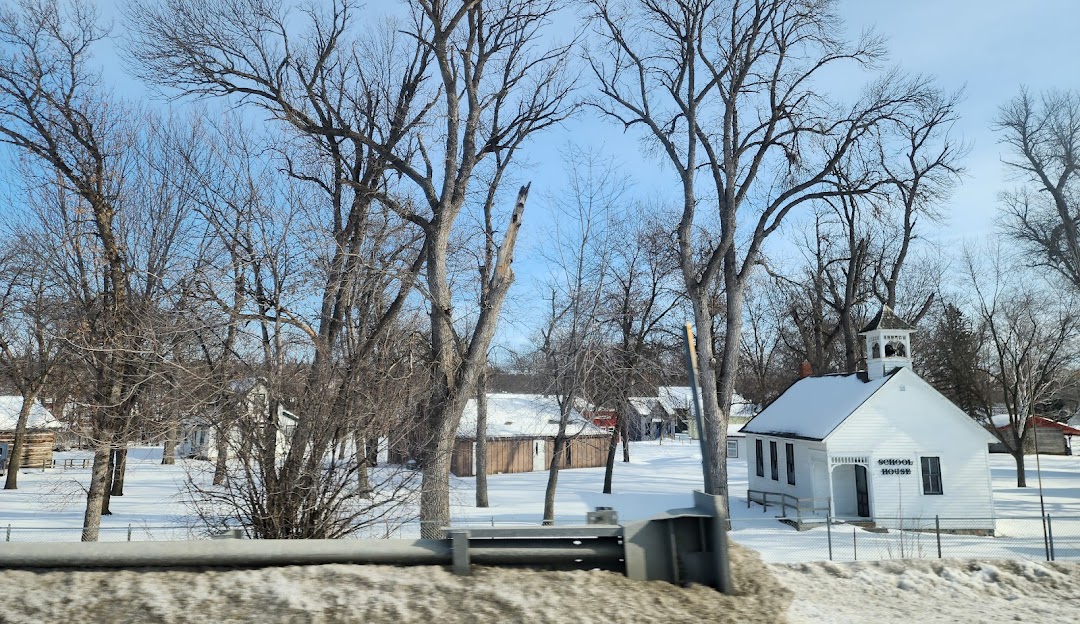 small church house in the snow and woods
