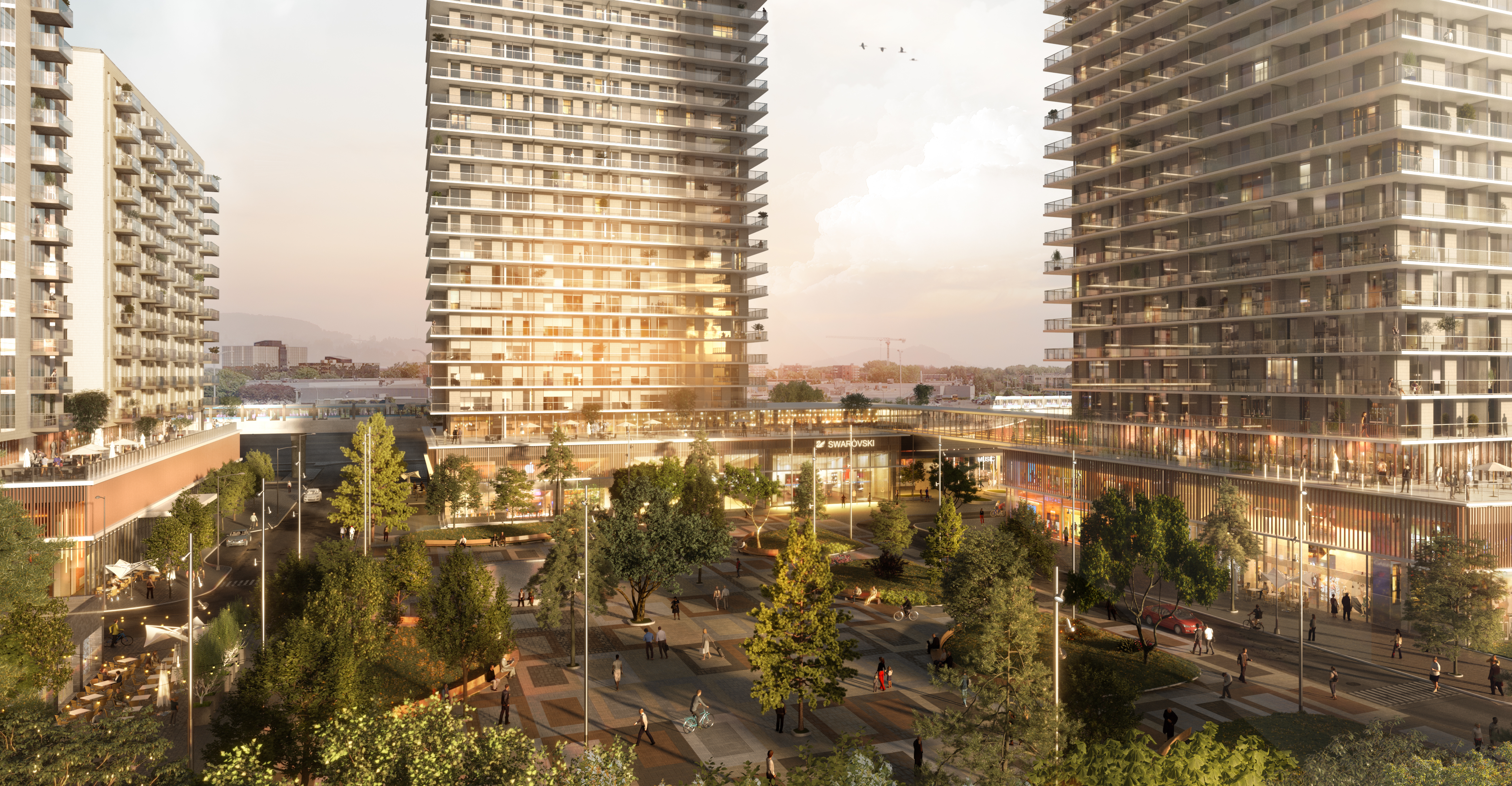 Rendering of planned buildings with a center courtyard filled with trees, walkways, and tables 